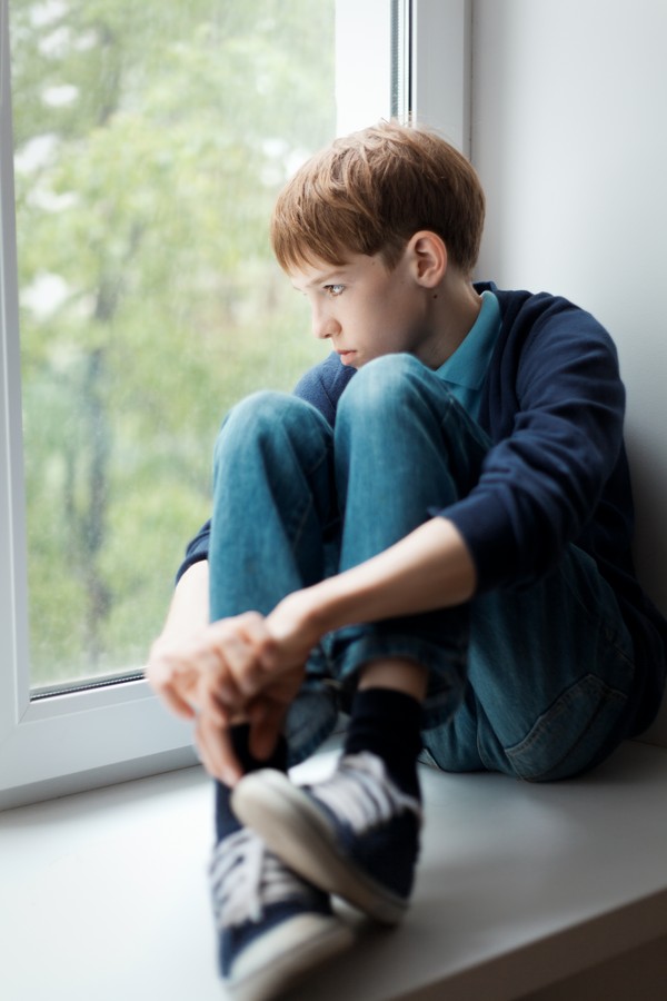 How is the age of transition in boys and girls manifested?