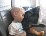 In an airplane and in a train with a small child In an airplane and in a train with a small child