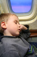 In an airplane and in a train with a small child In an airplane and in a train with a small child