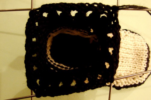 Black and white booties with knitting needles for summer