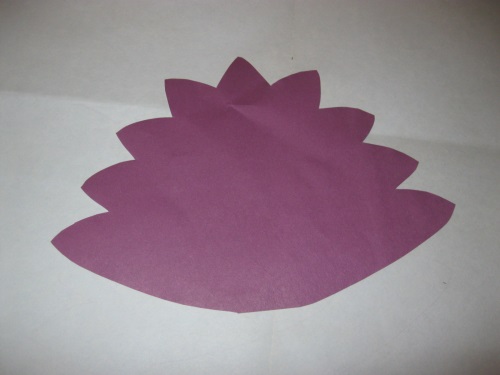 Fabulous peacock made of colored paper