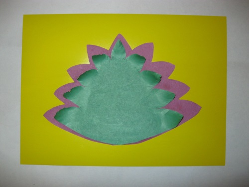 Fabulous peacock made of colored paper