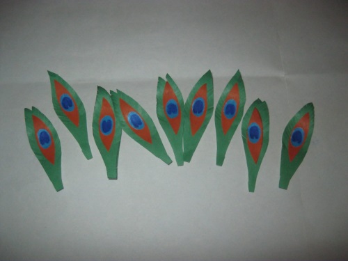 Fabulous peacock made of colored paper