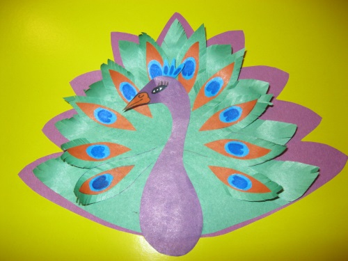 Fabulous peacock made of colored paper