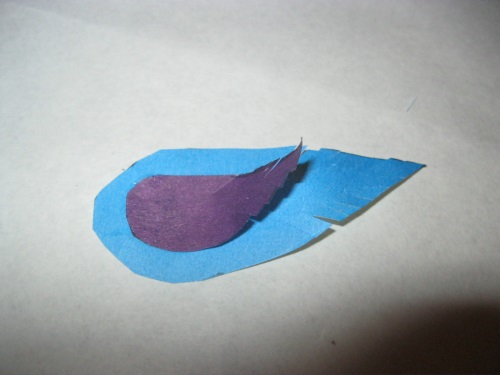 Fabulous peacock made of colored paper