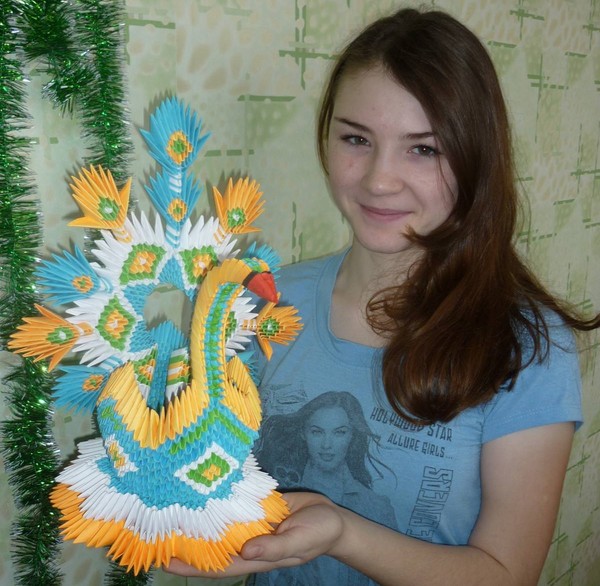 How to make a swan origami from modules - step by step instruction with photos and videos