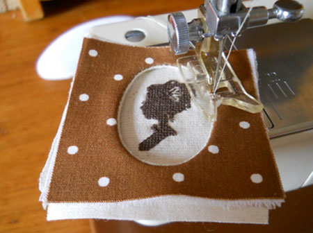 sew the workpiece on the machine 