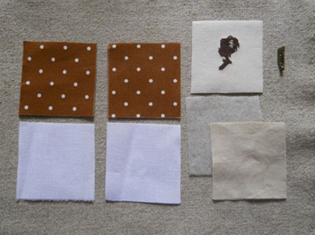 Cut out two identical squares from cotton