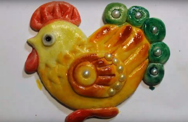 Rooster with his own hands