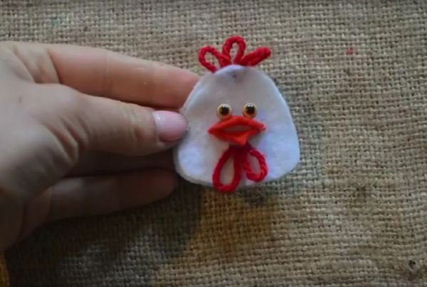 Rooster with his own hands