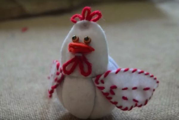 Rooster with his own hands