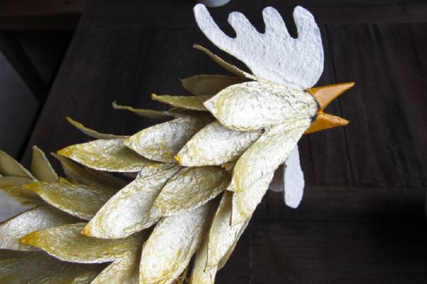 Rooster with his own hands