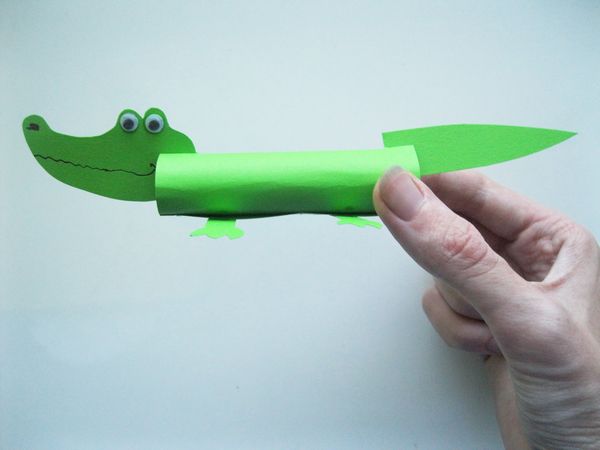Crocodile made of colored paper with own hands
