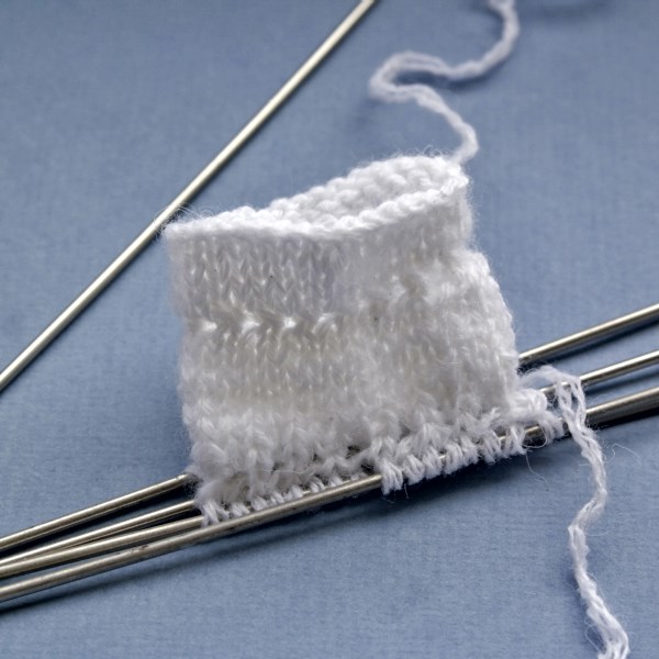 Pagolenok sock with patterned knitting needles