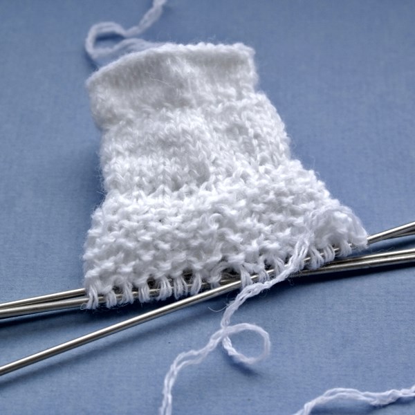 Pagolenok sock with patterned knitting needles