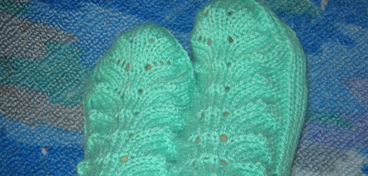 Knitted socks with patterns by own hands