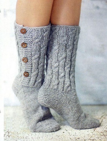 Knitted socks with patterns by own hands