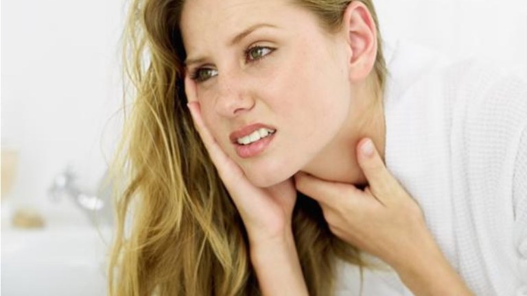 the girl has a sore throat