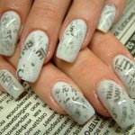Manicure with the help of the newspaper Manicure with the help of the newspaper