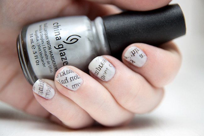 Manicure with the help of the newspaper Manicure with the help of the newspaper