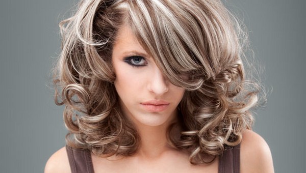 Melting thin strands of dark hair