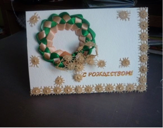 decoration of the joint of a wreath with a bow bow and inscription on the postcard