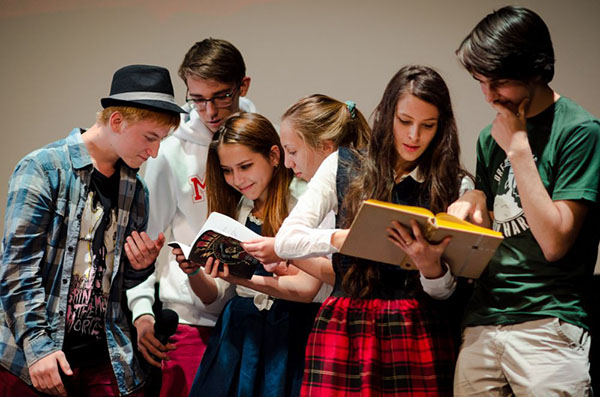 Dedication to students: scripts, competitions, song-alterations
