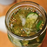 How to preserve cucumbers with onions for the winter
