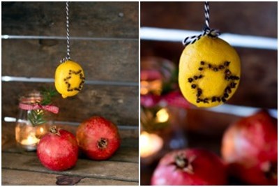 Attach the lemon to the string and hang it over the table.