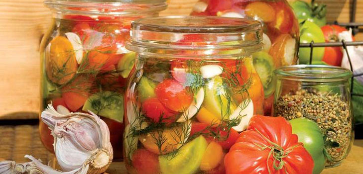 Freshly salted tomatoes in a bag and a saucepan