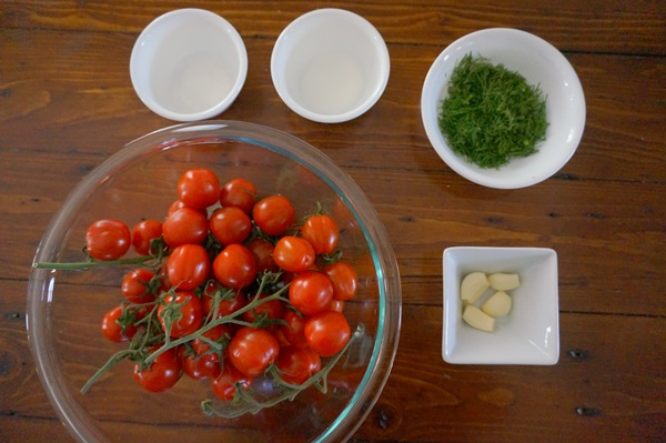 Freshly salted tomatoes in a bag and a saucepan