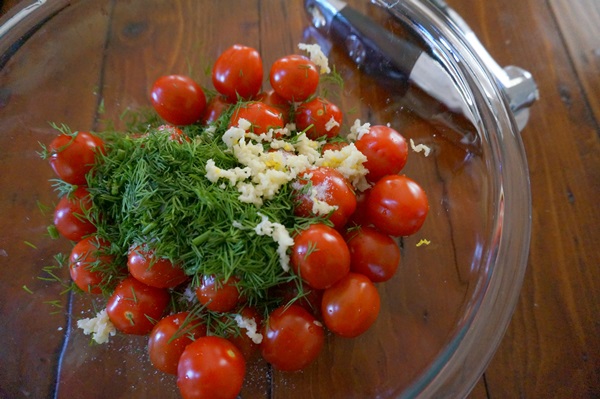 Freshly salted tomatoes in a bag and a saucepan