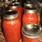 Cucumbers in tomato for the winter