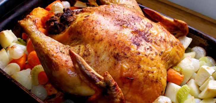 a chicken in the oven