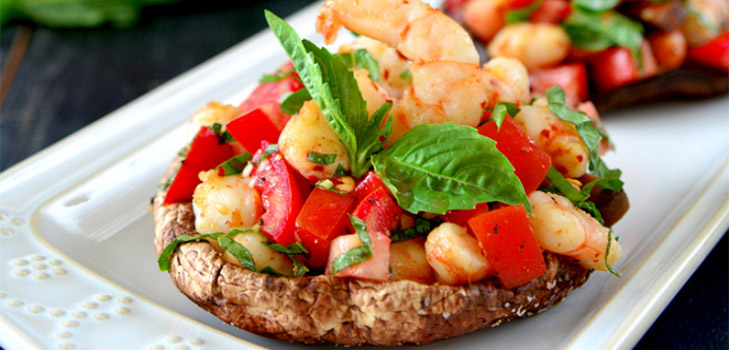 Grilled champignons with tomato and shrimp stuffing, delicious recipe