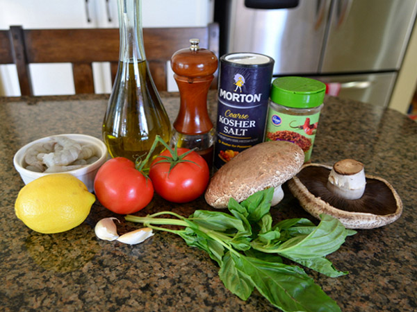 Grilled champignons with tomato and shrimp stuffing, delicious recipe