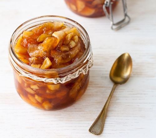 Apple jam with almonds and dried apricots in a multivariate