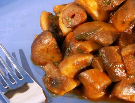 Fried white mushrooms in different dishes