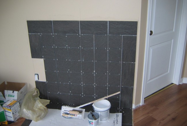 Laying tiles on the wall