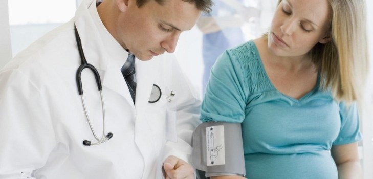 the woman is measuring the pressure